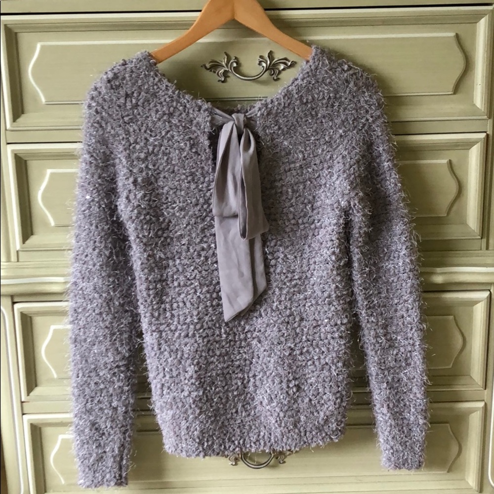 Jennifer Lopez Tie back sweater